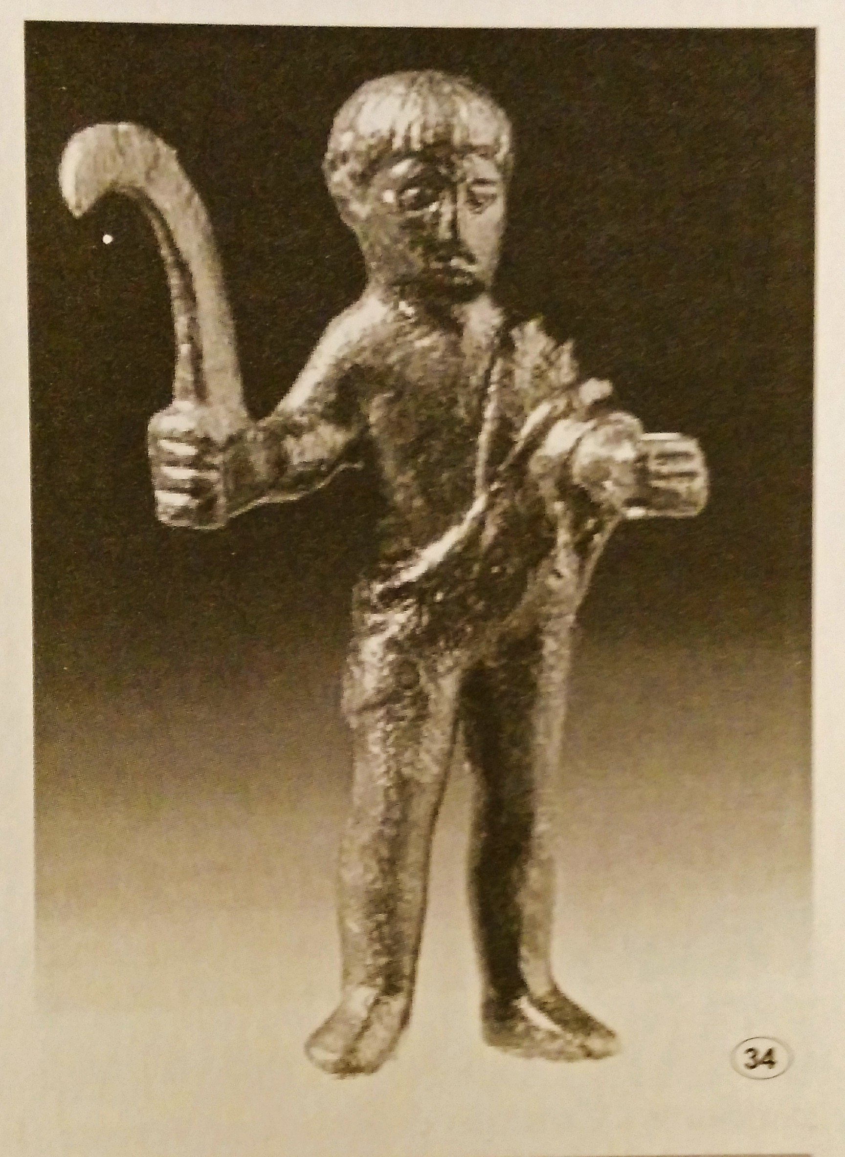 God Silvano Etruscan - Ghiaccioforte (Grosseto) Etruscan bronze votive III century b.C. Young naked man with a ''pennato'' in his right hand.