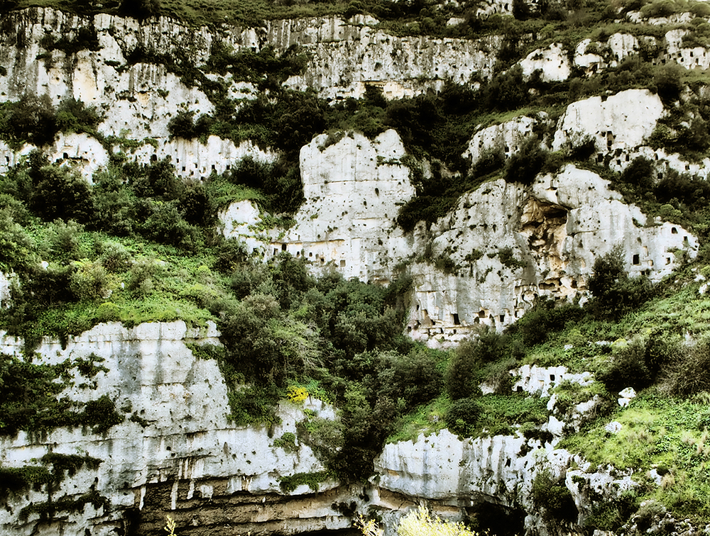 The Bronze Age site of Pantalica in Sicily, situated along the gorges of the Hyblaean mountains, locally called caves, is made up of about 5,000 hypogeal cavities carved out of the slope